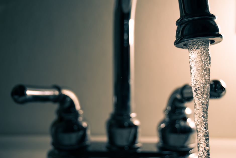 The kitchen faucet runs for the first time after a long winter.