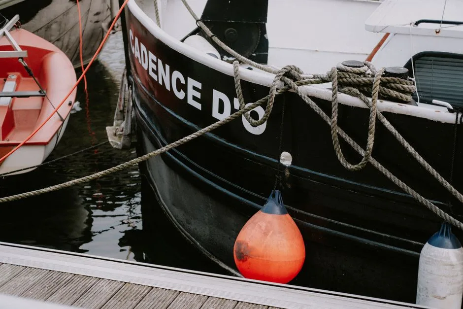 Boats of all sizes are tied along the dock wall for the blessing.