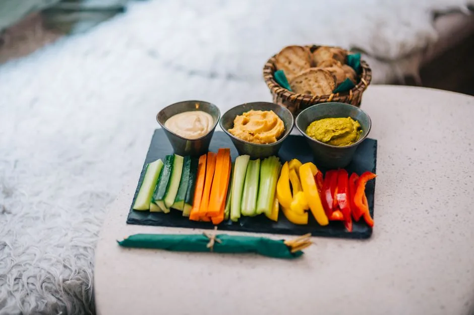 Vegetables and dips, brought to the table without being ordered.